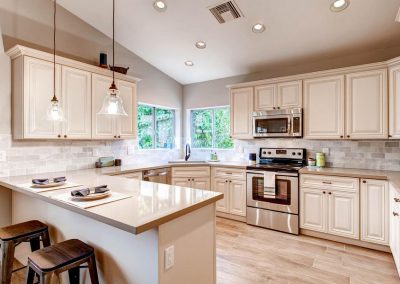 Antique White Traditional Kitchen Cabinets in Colorado Springs